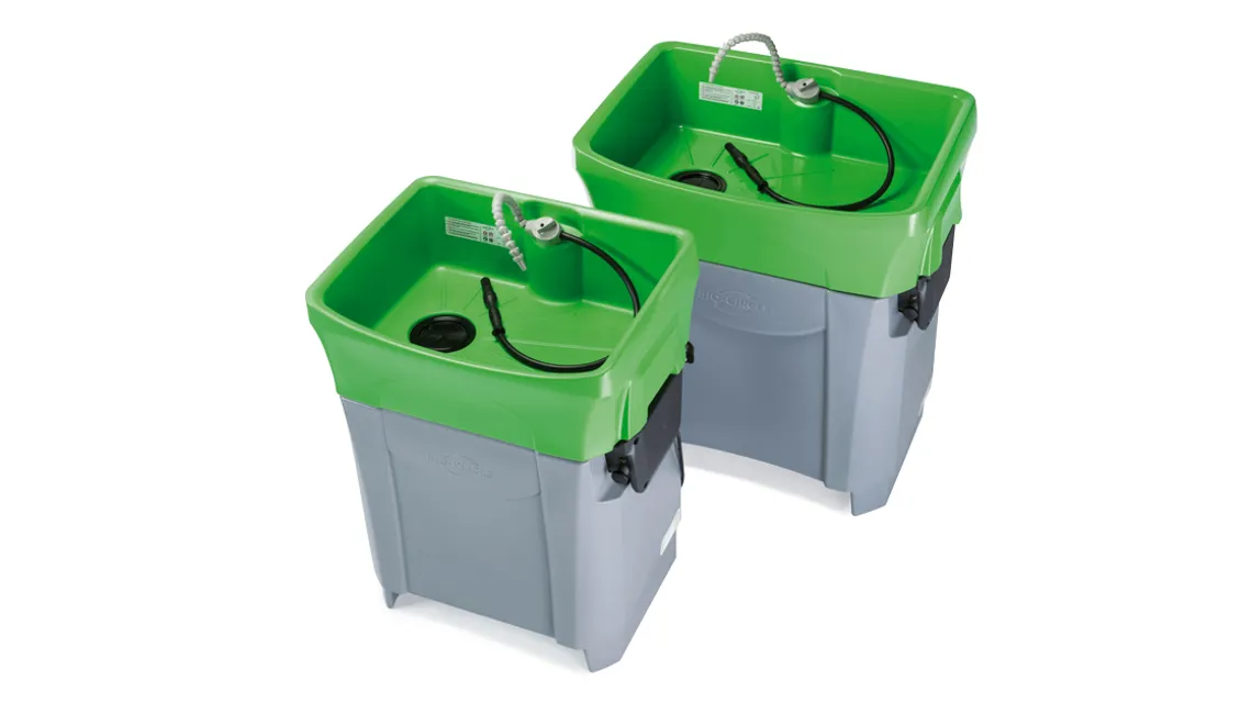 Parts washers and cleaning systems for industry